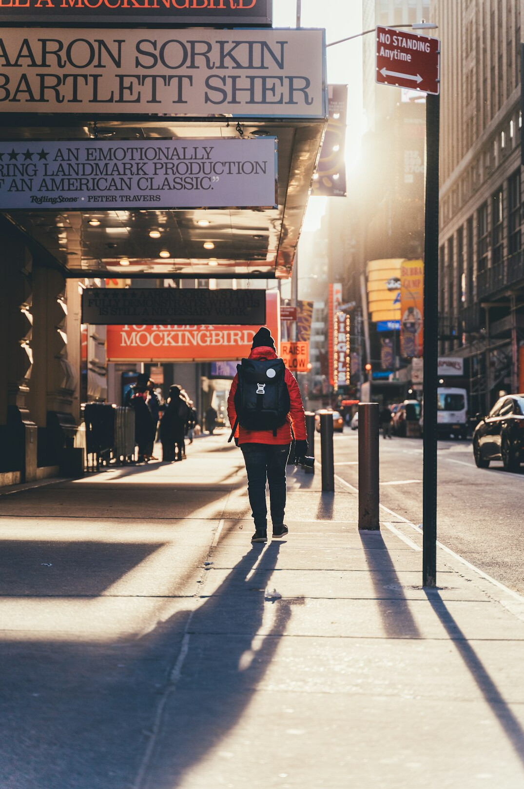 person walking in city street